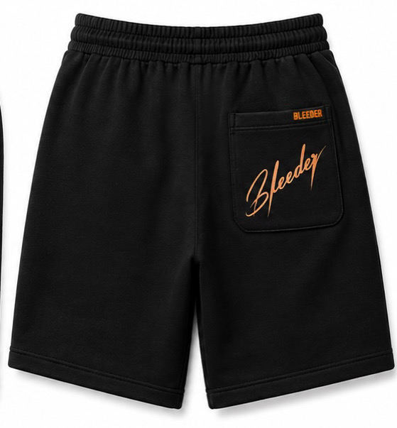 The Signature Short — Orange on Black back